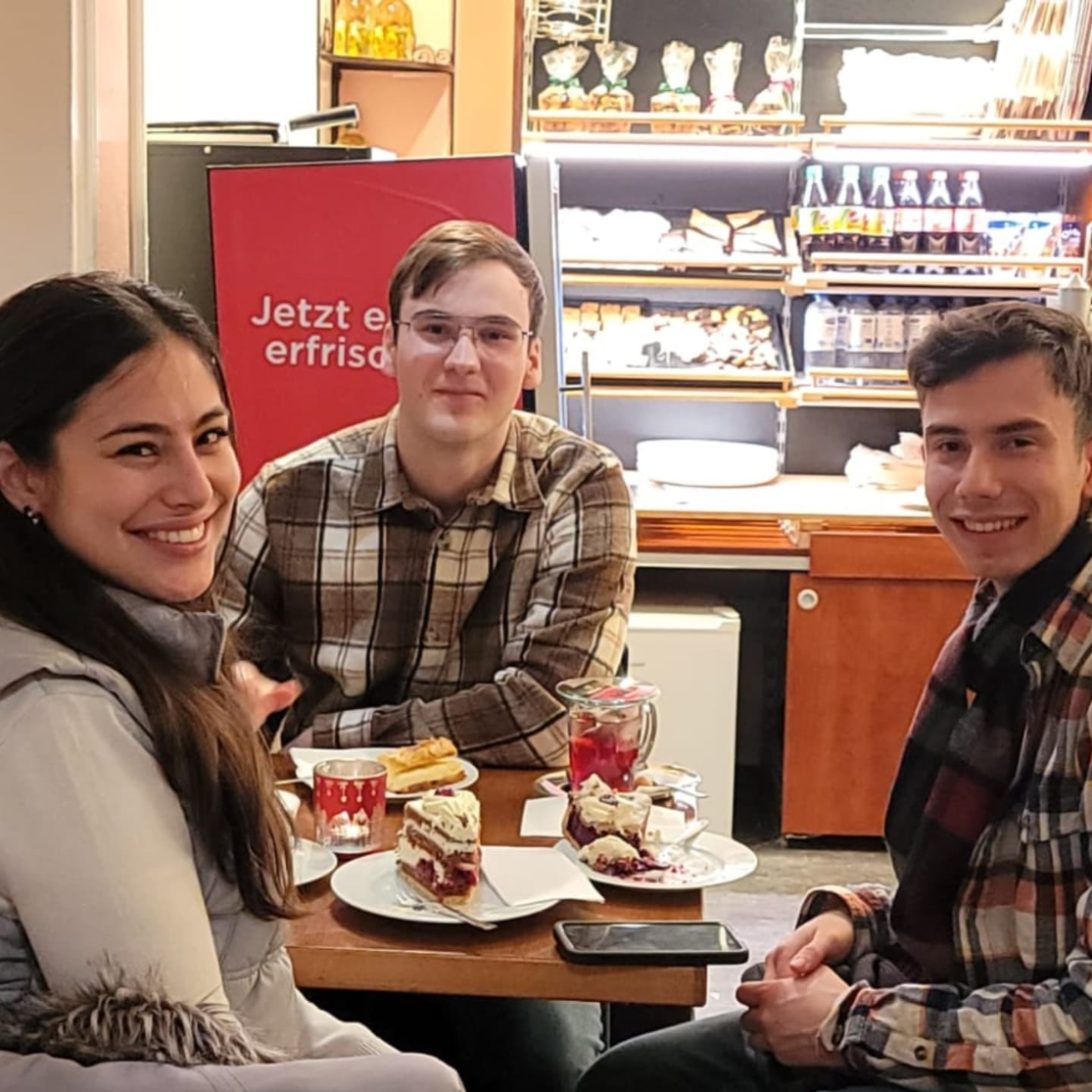 With two friends in a café