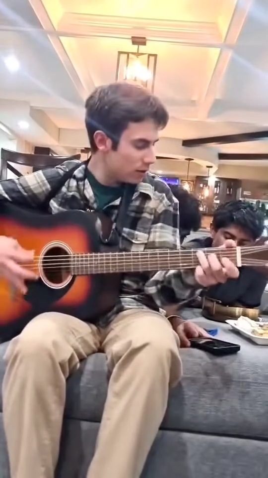 Playing guitar
